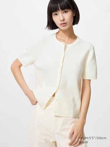 Кардиган с коротким рукавом и застёжкой на пуговицы и бахрому