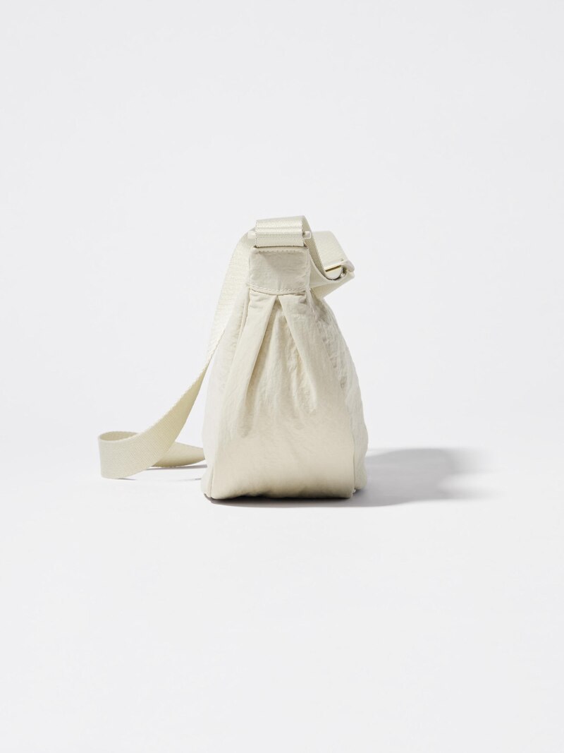 Круглая мини сумка на плечо